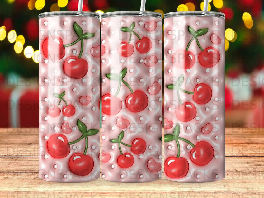 Pink tumbler with a repeating pattern of red cherries and small hearts.