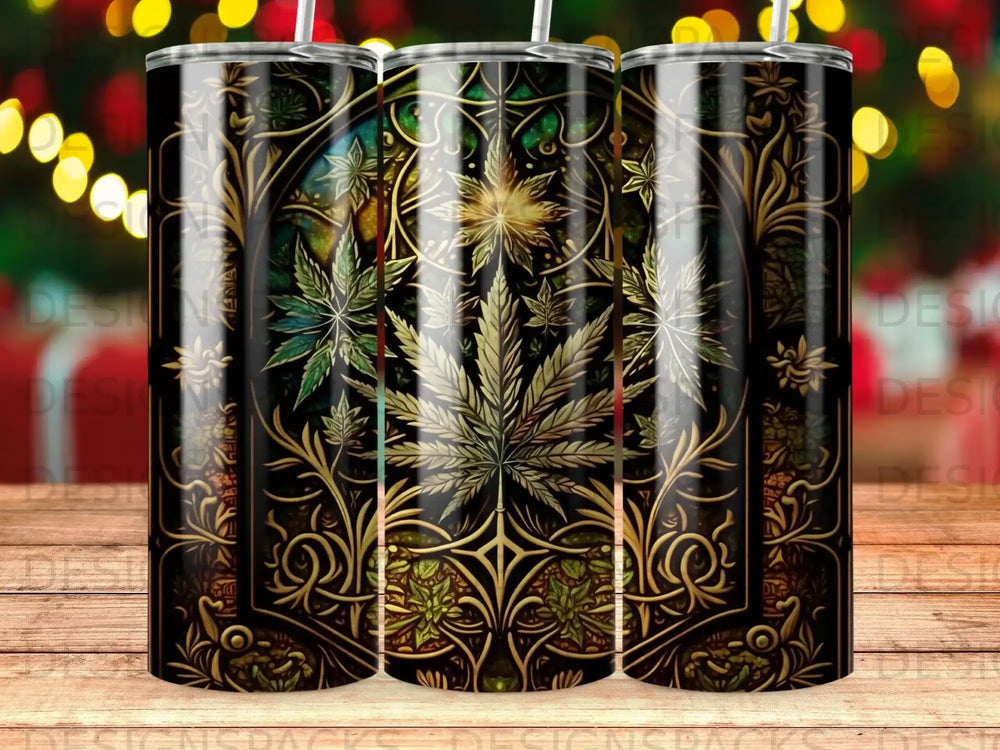 Tumbler with cannabis leaf and ornate gold scrollwork design.