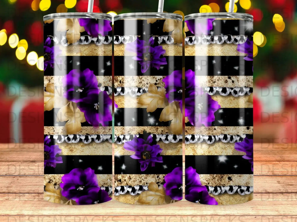 Tumbler with purple flowers, gold accents, and black and white stripes.