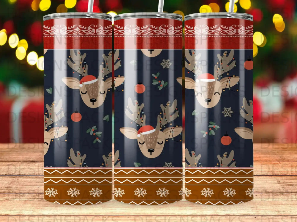 Christmas tumbler with reindeer, snowflakes, and lights pattern.