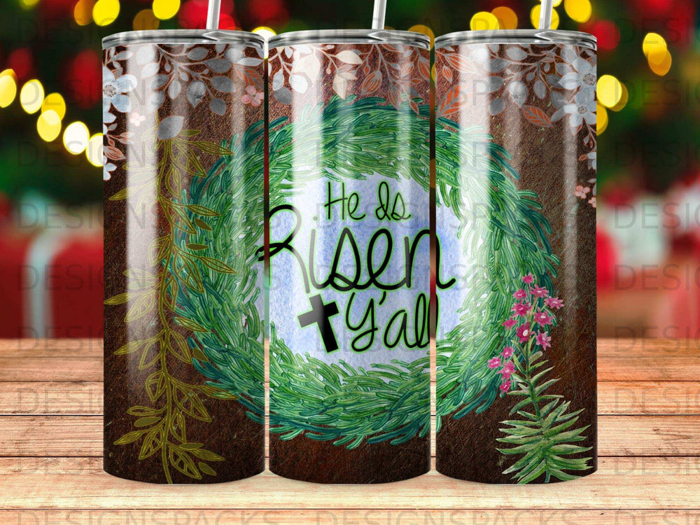 "He is risen y'all" text on a rustic Easter wreath tumbler design.