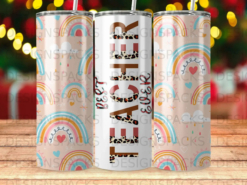 Teacher 2023 tumbler with rainbows and hearts pattern.