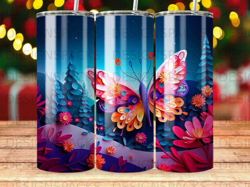 Butterfly and floral design on a cylindrical tumbler with a dark, wooded background.