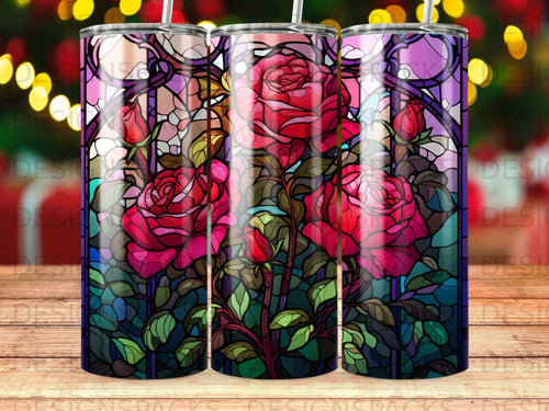 Stained glass roses in vibrant pink and red against a dark background.