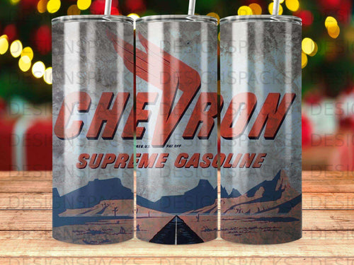Chevron Supreme Gasoline tumbler with desert landscape and light bokeh background.