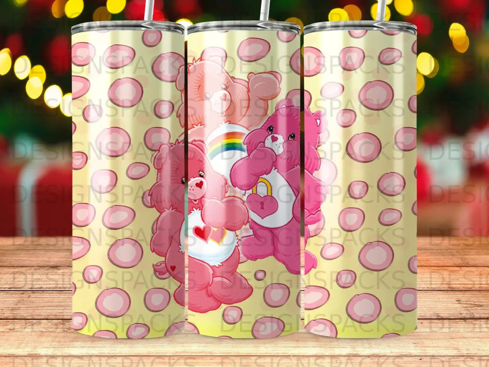 Three pink Care Bears with hearts and rainbows on a yellow, patterned background.