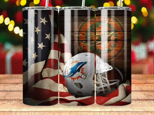 American flag and Miami Dolphins football helmet on wood grain background.