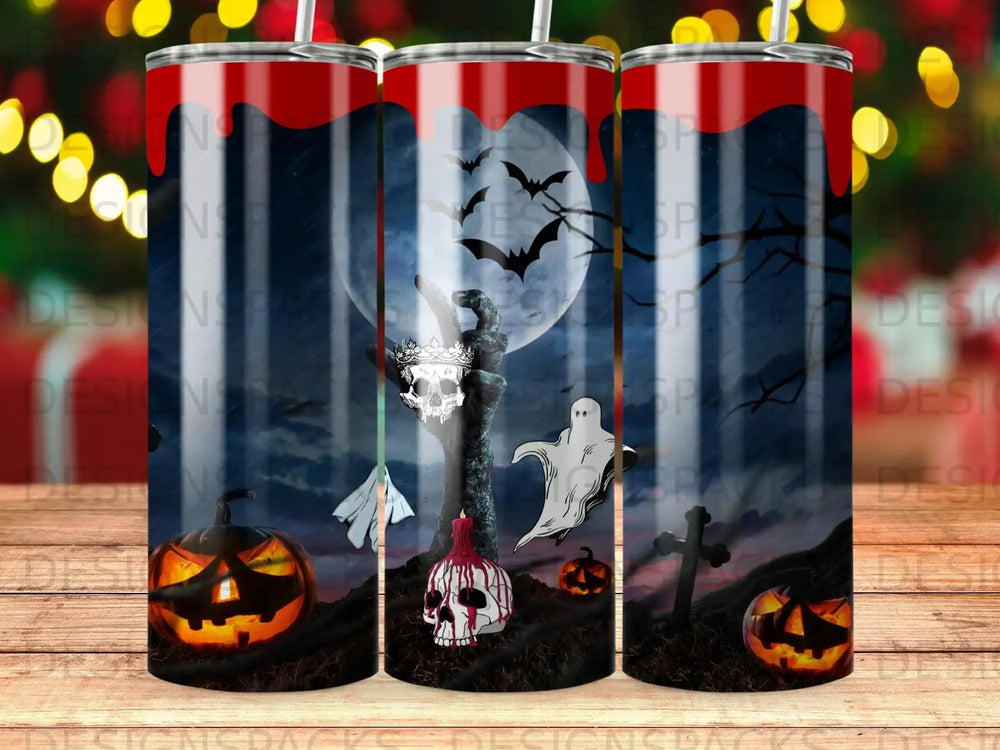 Halloween tumbler with pumpkins, ghosts, bats, and a skeleton hand.