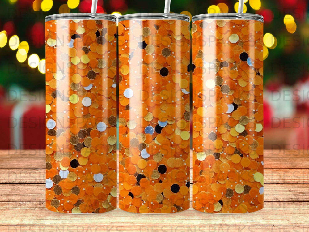 Orange tumbler with sparkling gold and white confetti pattern.