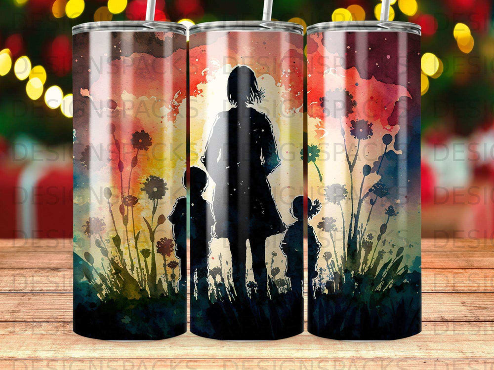 Silhouette of a mother and two children standing in a field of flowers at sunset.
