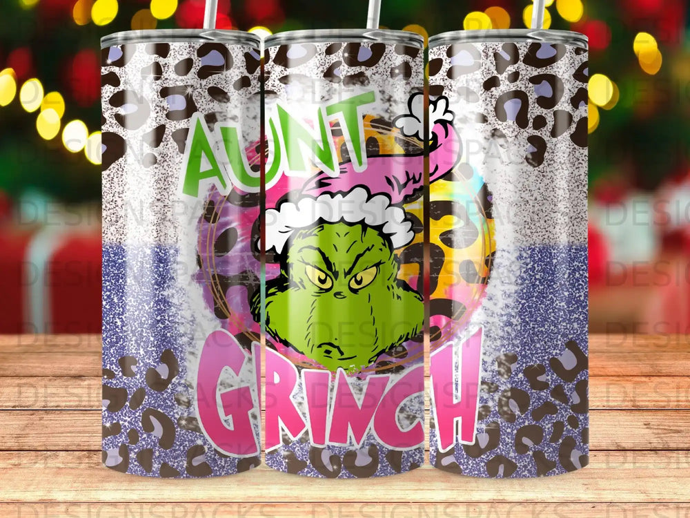Grinch "Aunt Grinch" tumbler with leopard print and glitter design.
