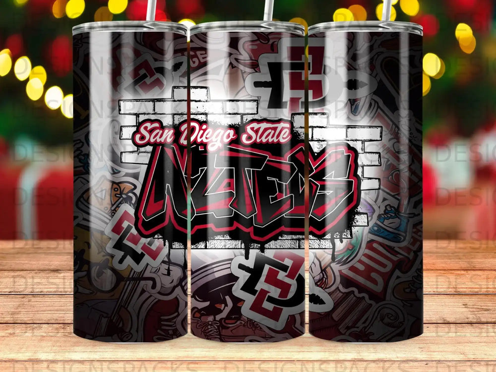 San Diego State Aztecs graffiti logo on a tumbler with a brick background.
