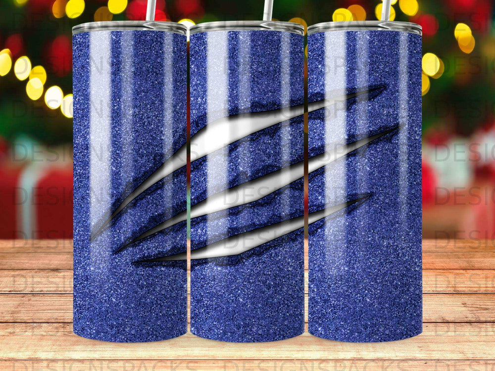 Blue glitter tumbler with claw marks design.
