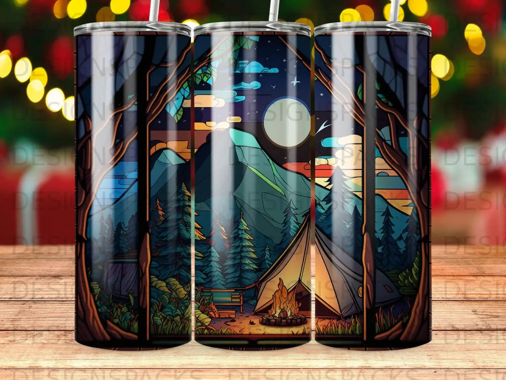 Tent and campfire under a starry night sky with mountains and trees.