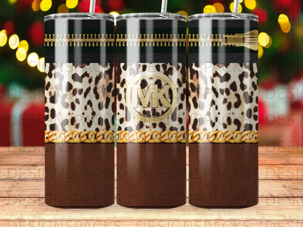 Three stainless steel tumblers with leopard print and gold zipper design.