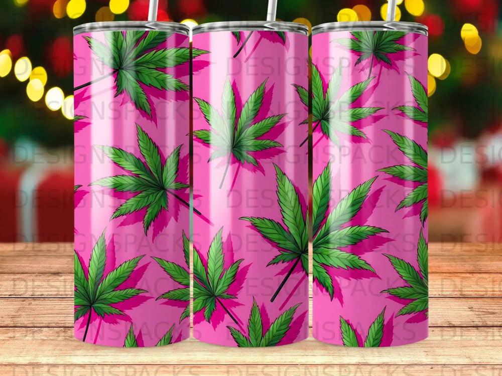 Pink tumbler with repeating green cannabis leaf pattern.
