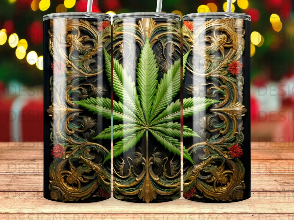 Cannabis leaf design on a black tumbler with ornate gold scrollwork and red flowers.