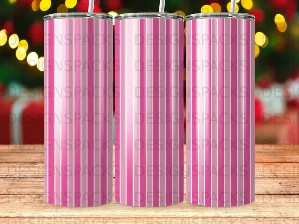 Three tumblers with a pink and white striped design stand side-by-side.