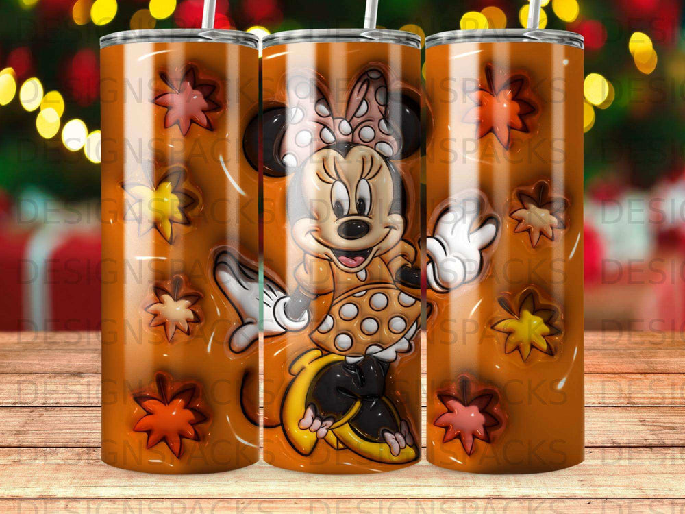 Minnie Mouse in autumn outfit on a caramel and leaf patterned tumbler.