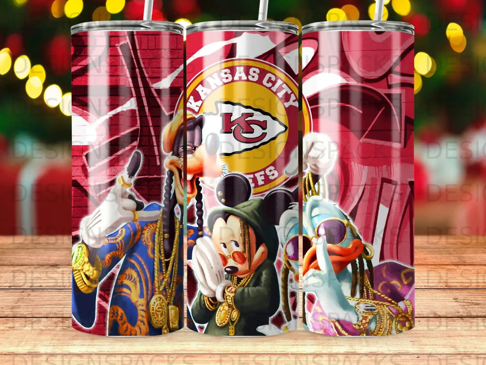 Mickey Mouse, Goofy, and a man in a gilded outfit with Kansas City Chiefs logos.
