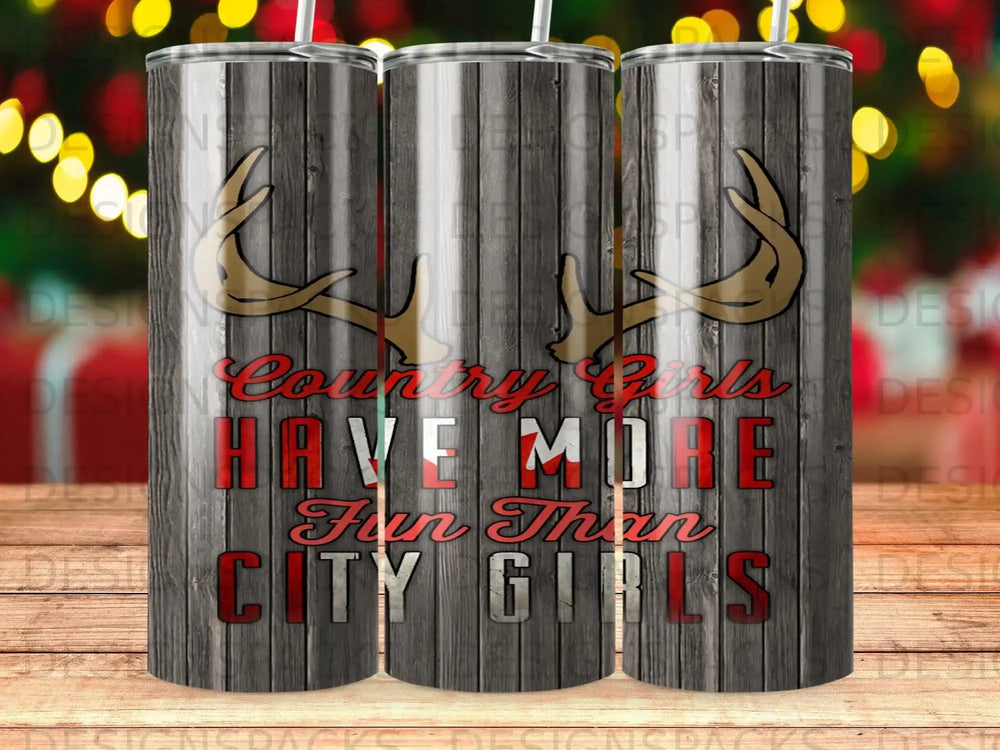 Tumbler with "Country Girls Have More Fun Than City Girls" text and antlers.