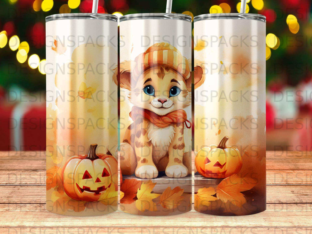 Lion cub with pumpkins and autumn leaves on wood.