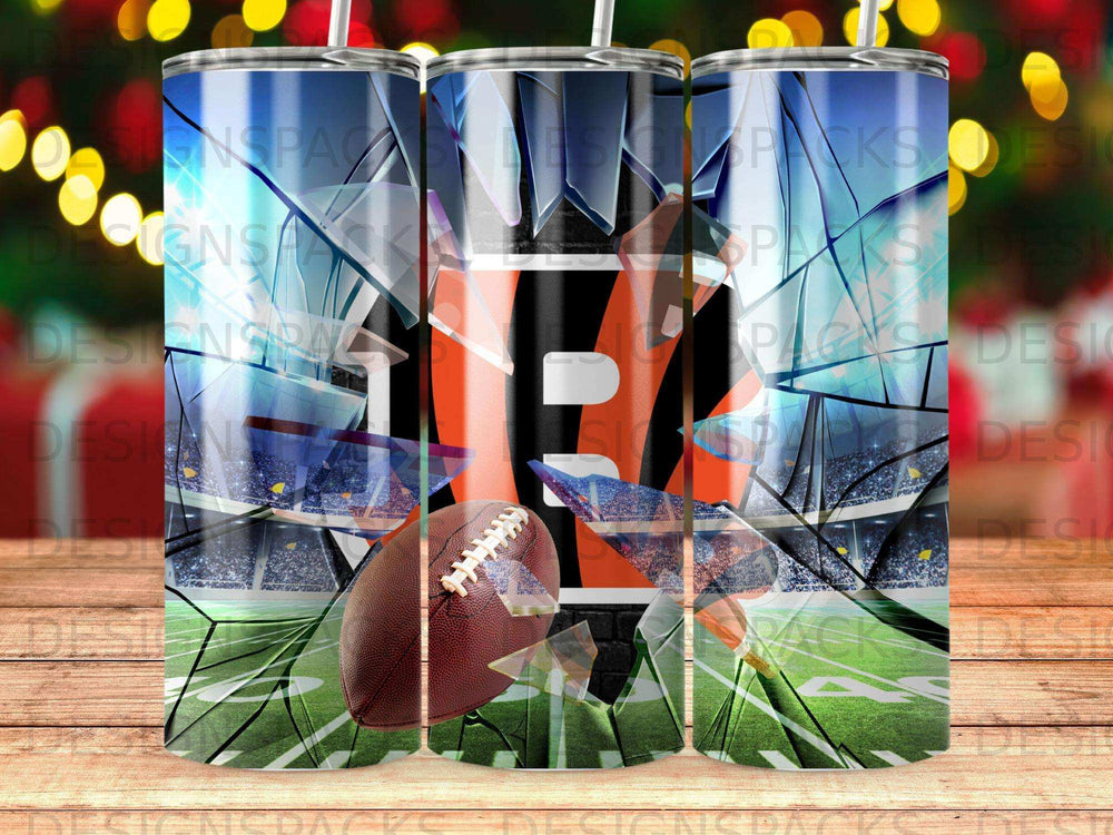Football and shattered glass design on a blue tumbler.
