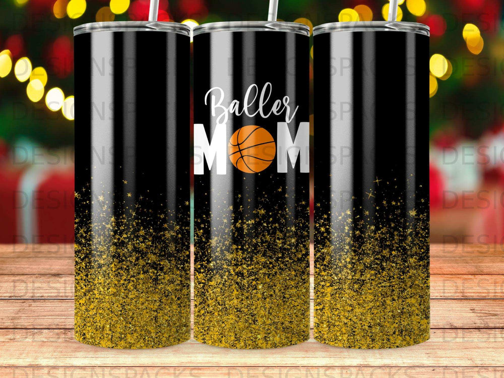 Tumbler with "Baller Mom" text and gold glitter design.