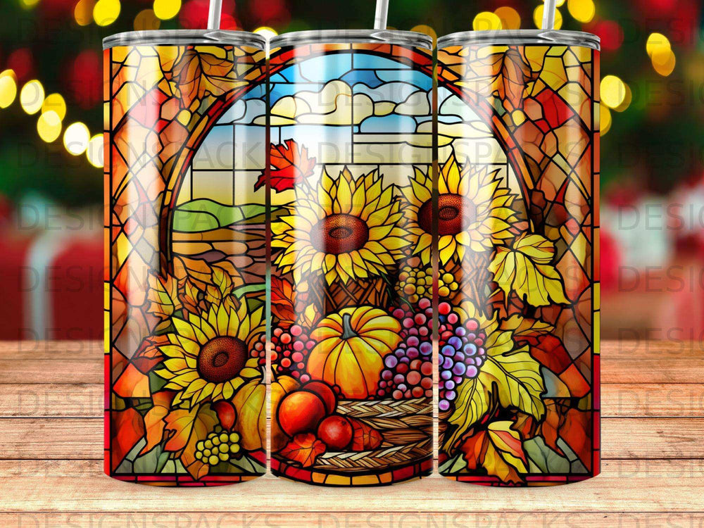 Stained glass tumbler with sunflowers, pumpkins, grapes, and autumn leaves.