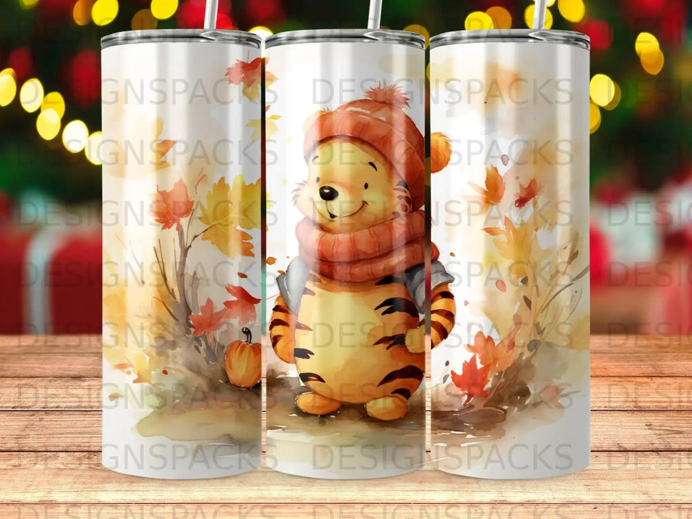 Tigger in a scarf with pumpkins and autumn leaves.
