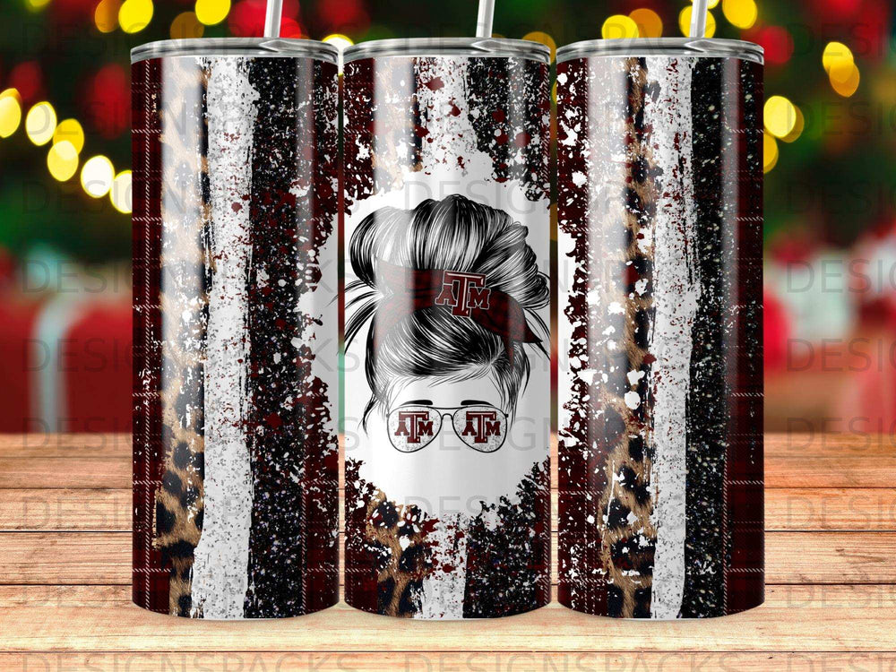 Tumbler with maroon and white stripes, leopard print, and "AM" logo.