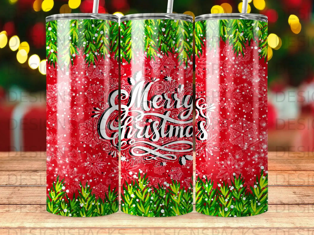 Red tumbler with "Merry Christmas" text and green garland.