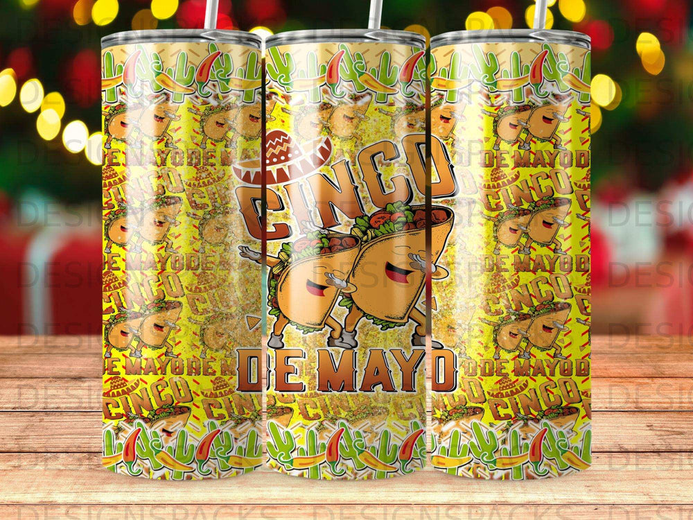 Cinco de Mayo themed tumbler with smiling tacos and festive decorations.