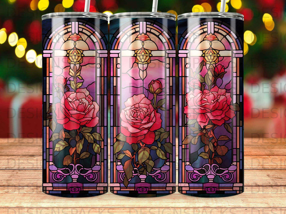 Three stained glass tumblers featuring a pink rose design on a dark background.