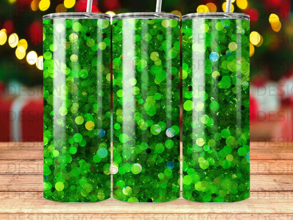 Three tumblers with a green glitter pattern and bokeh effect.