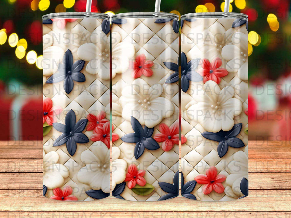 Tumbler with white quilted background and red and blue floral pattern.