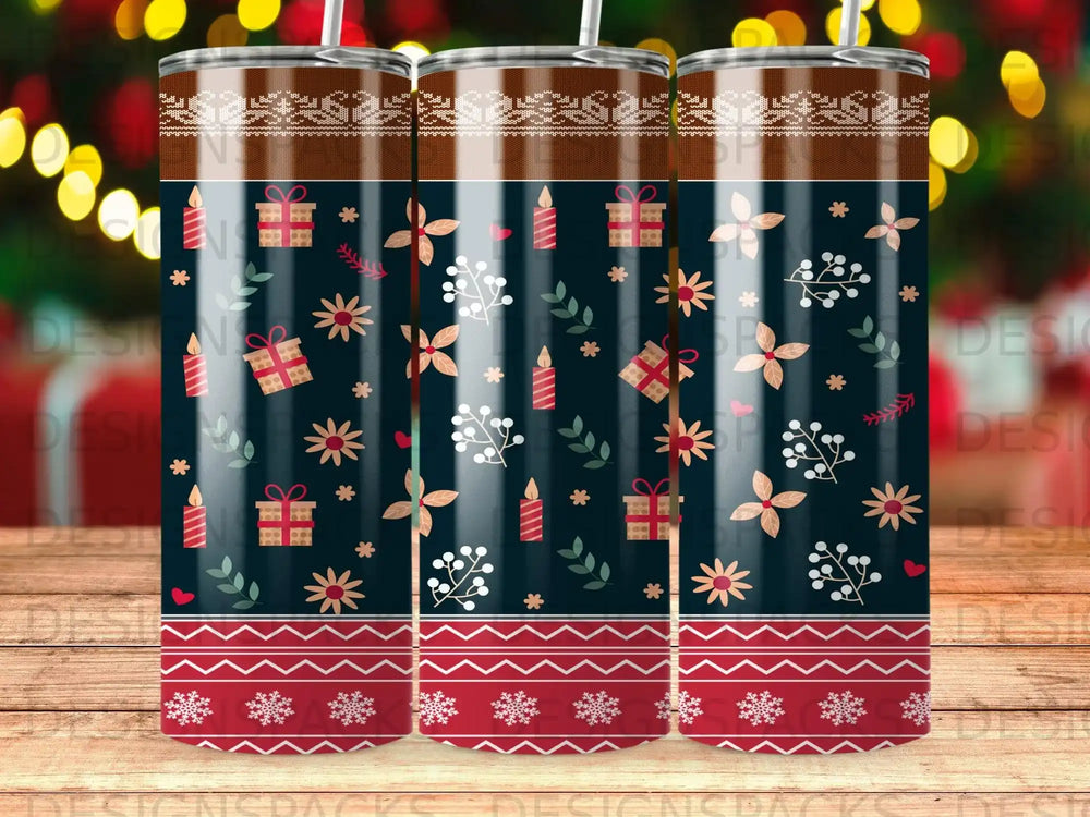 Dark navy tumbler with festive red, white, and blue snowflake and floral pattern.