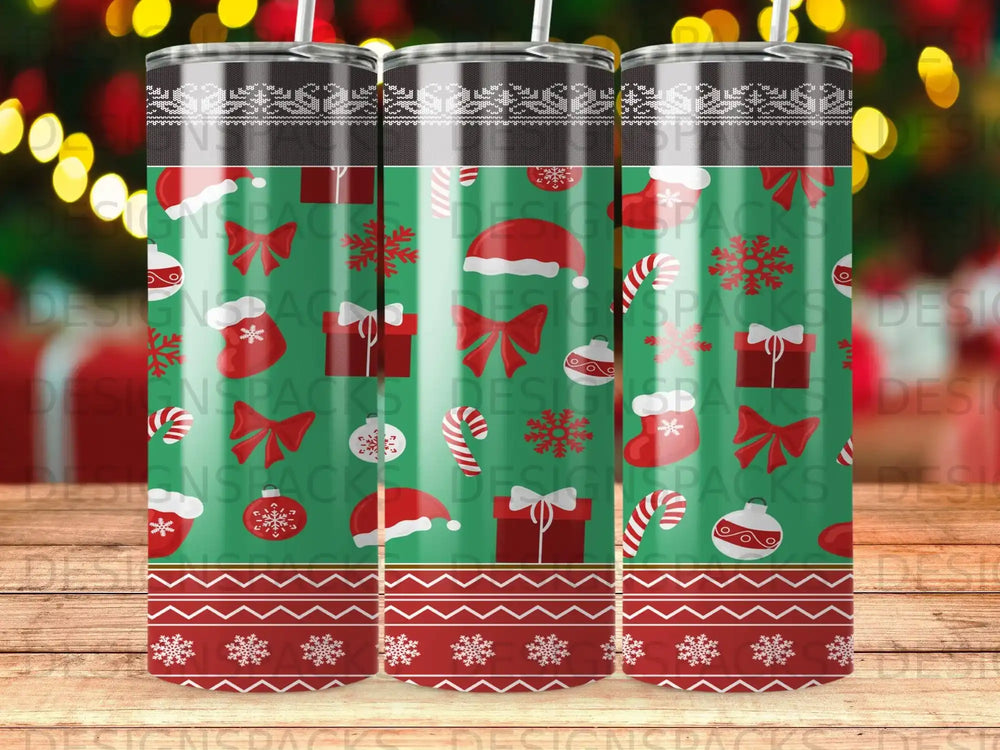 Three green tumblers with Christmas pattern and holiday designs.
