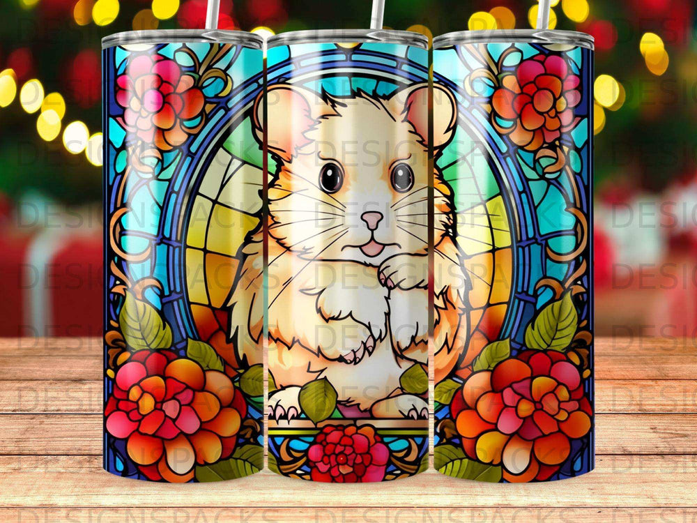 Stained glass hamster with floral border on a tumbler.