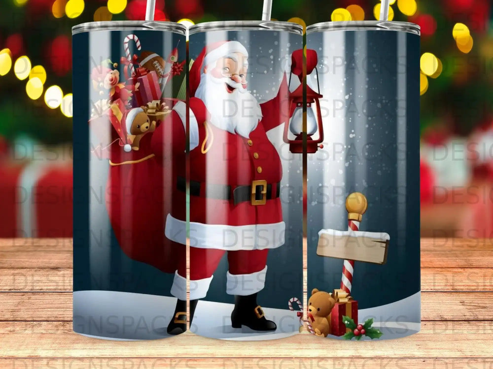 Santa Claus with gifts and a teddy bear on a blue patterned tumbler.