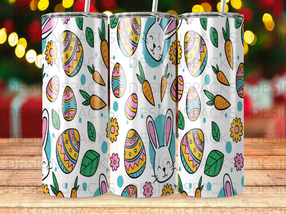 Easter bunny, carrots, and patterned eggs on a white tumbler.