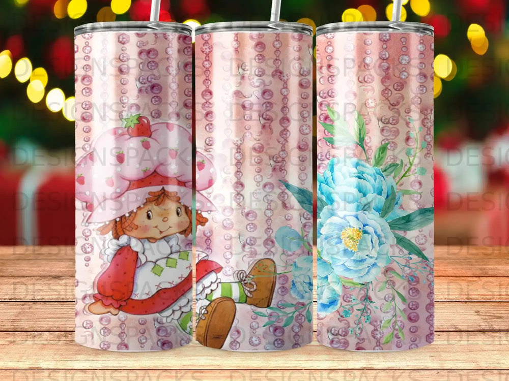Strawberry Shortcake with blue flowers and pink beads on a patterned background.