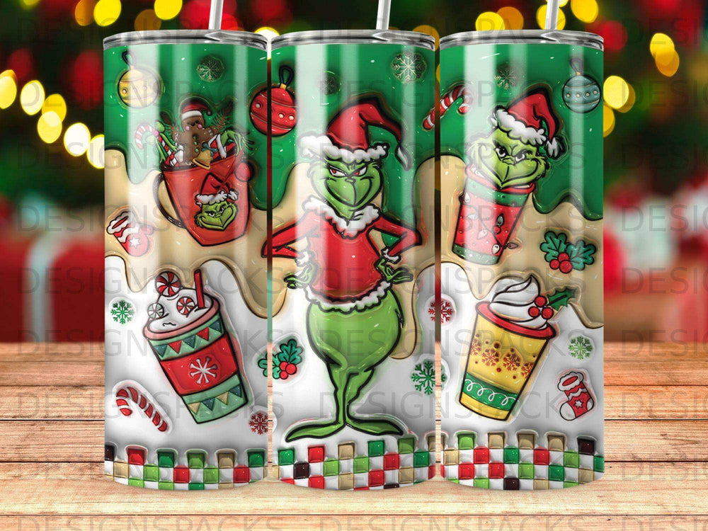Three green Grinch tumblers with Christmas designs and candy cane stripes.