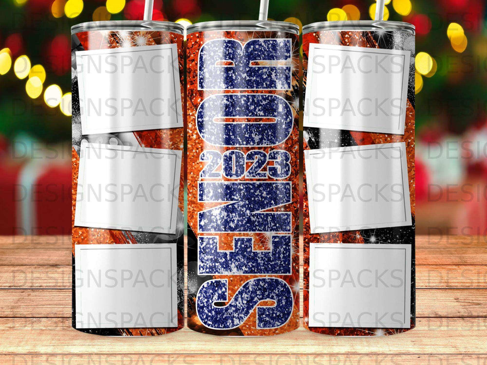 Tumbler with "BORN 2023" text and sparkly orange and blue design.