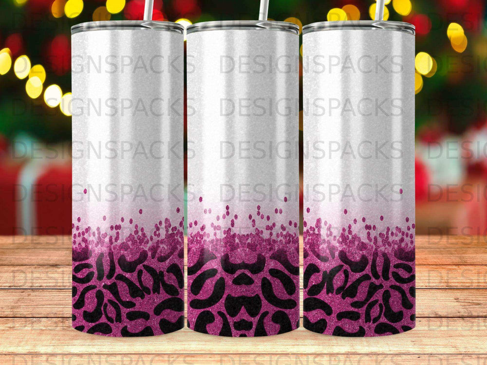 Three tumblers with pink glitter and black leopard print.
