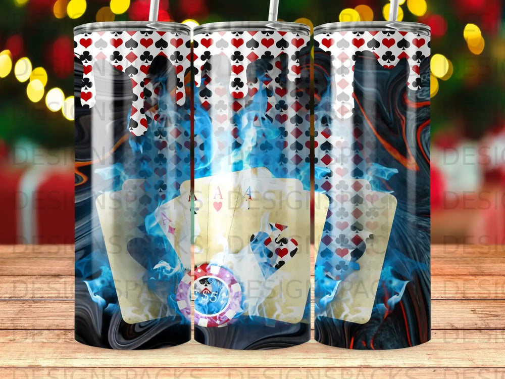 Playing cards, poker chips, and flames on a cylindrical tumbler.