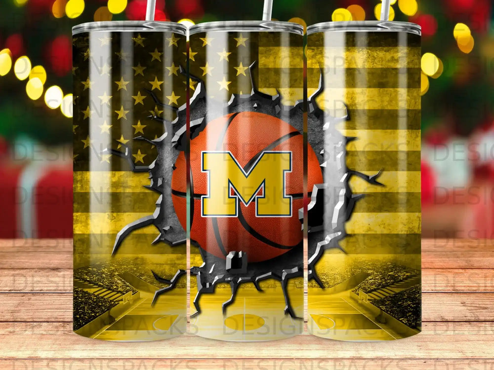 Michigan Wolverines basketball tumbler with American flag and stadium background.