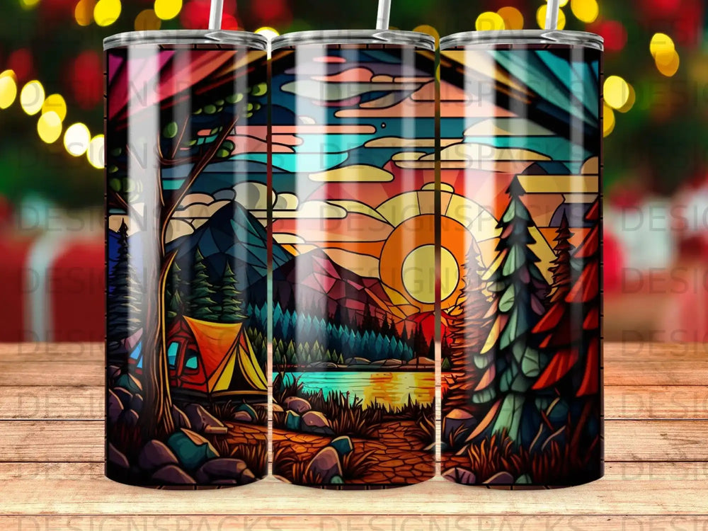Stained glass tumbler featuring a mountain landscape with a tent and lake at sunset.
