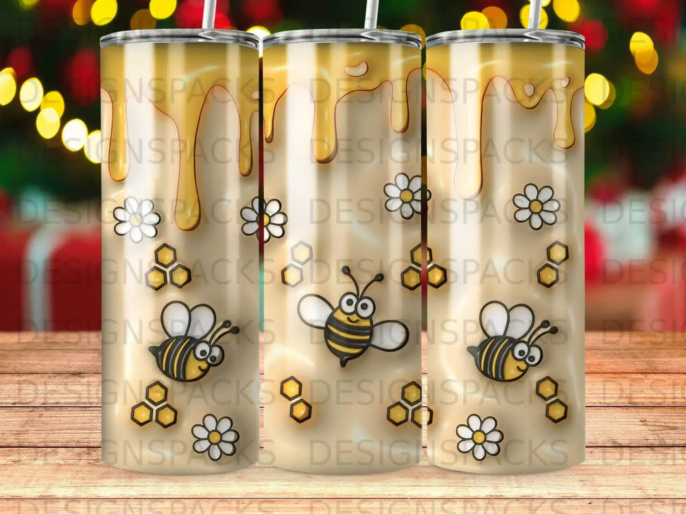 Tumbler with bees, flowers, and honeycomb pattern.