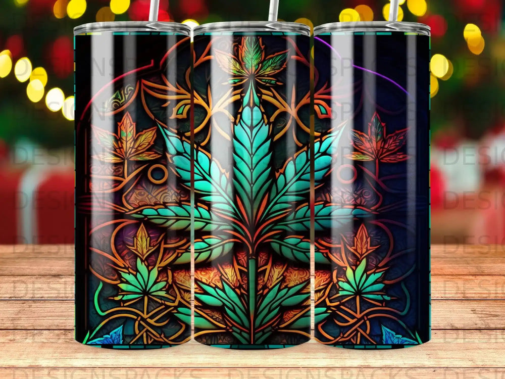 Tumbler with a colorful cannabis leaf design and ornate patterns.